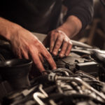 mechanic checks the MAP sensor