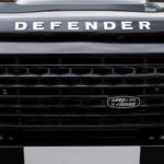 closeup of land rover defender logo