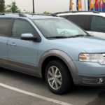 guy parking his ford taurus x