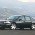 man cruising with his chevrolet impala ss