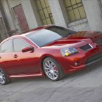 man parking his mitsubishi galant ralliart