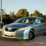 man parking his toyota camry 1