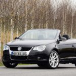 man parking his volkswagen eos