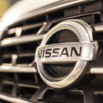 nissan logo on car grille