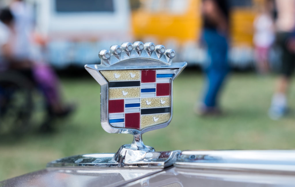 , Why Do Cadillac&#8217;s Badges Sit High on the Grille?