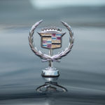 cadillac badge sits high on car grille