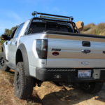 ford raptor in an offroad trail