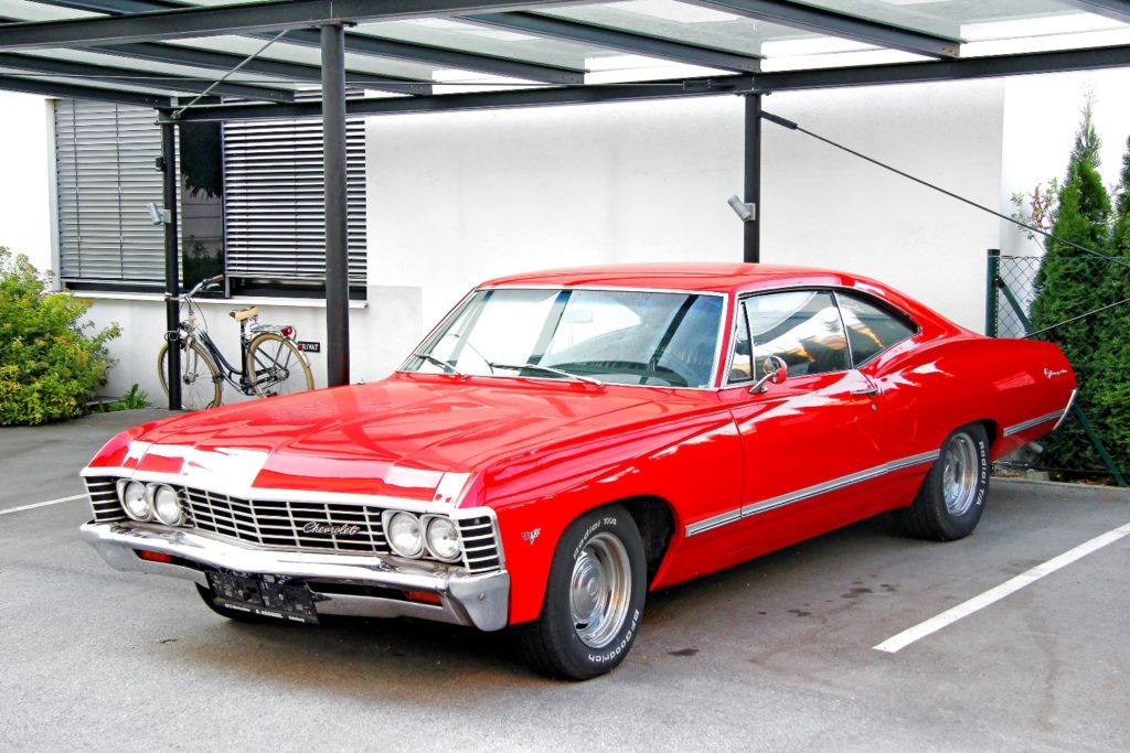 Classic Chevrolet Impala parked outside