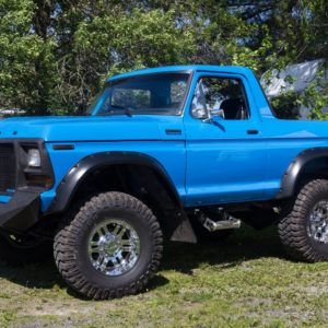 classic ford bronco parked outside