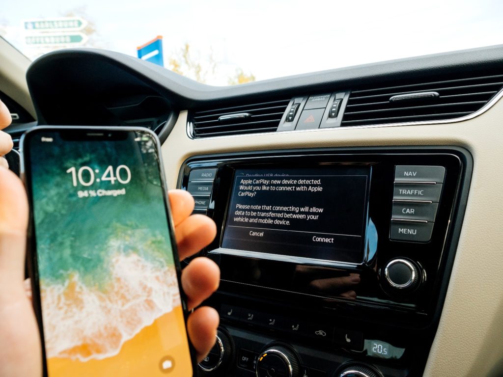 Driver connecting to Apple CarPlay