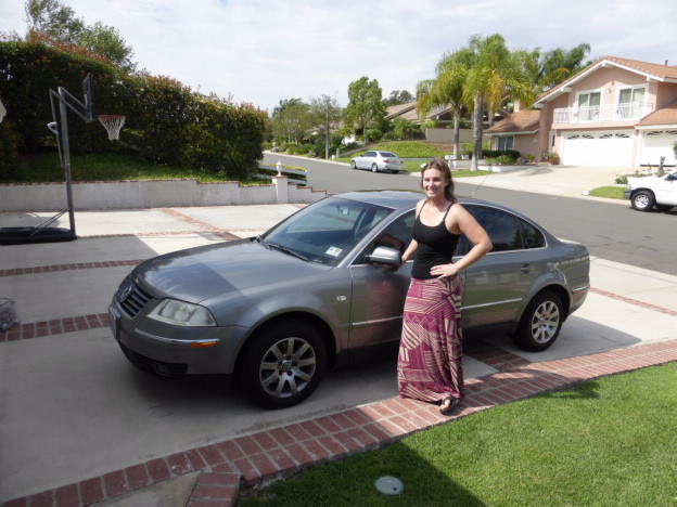 Girl beside Volkswagen Passat