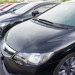 honda cars lined up in parking lot