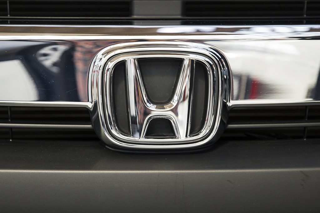 Honda chrome logo on car grille