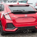 red honda civic type r parked outside