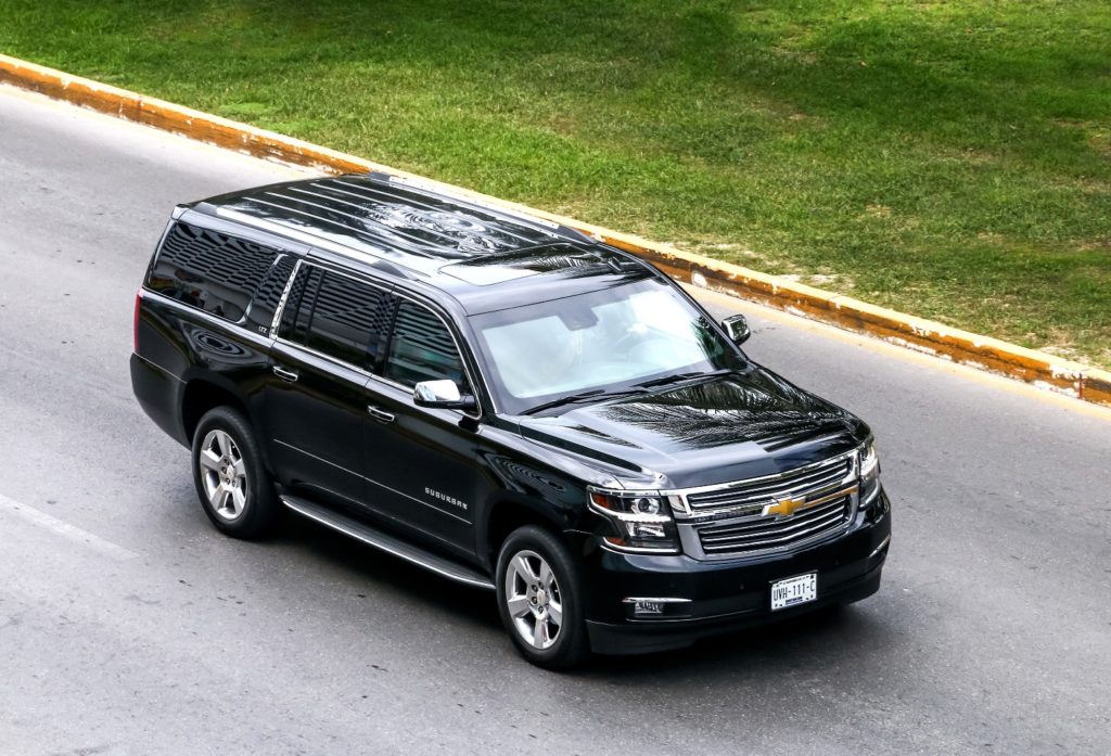 Chevrolet Suburban parked by the road