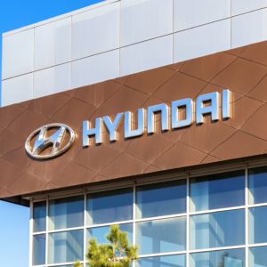 hyundai logo on facade of dealership building