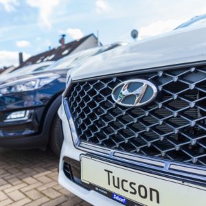 new hyundai cars lined up in parking lot