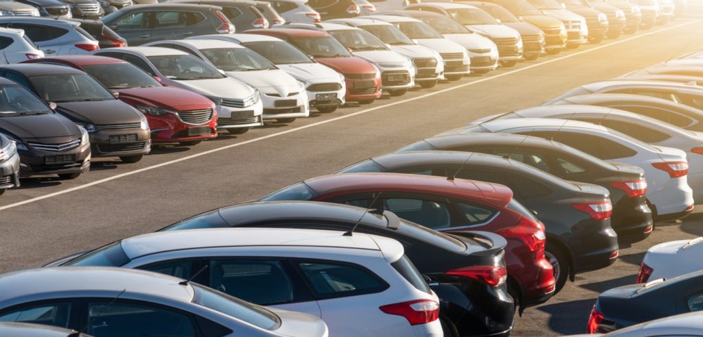 Cars orderly parked in parking lot