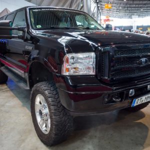 ford excursion on display in showroom