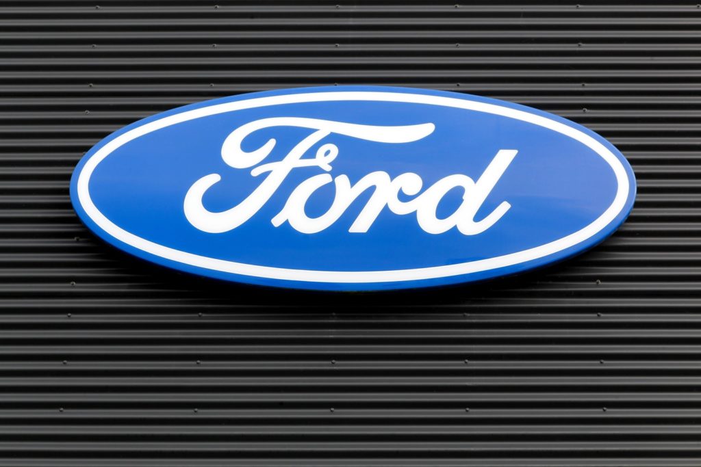 ford logo on gray wall