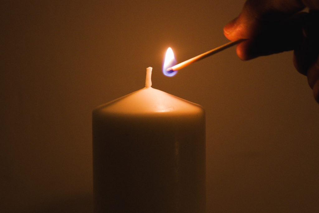 lighting a candle