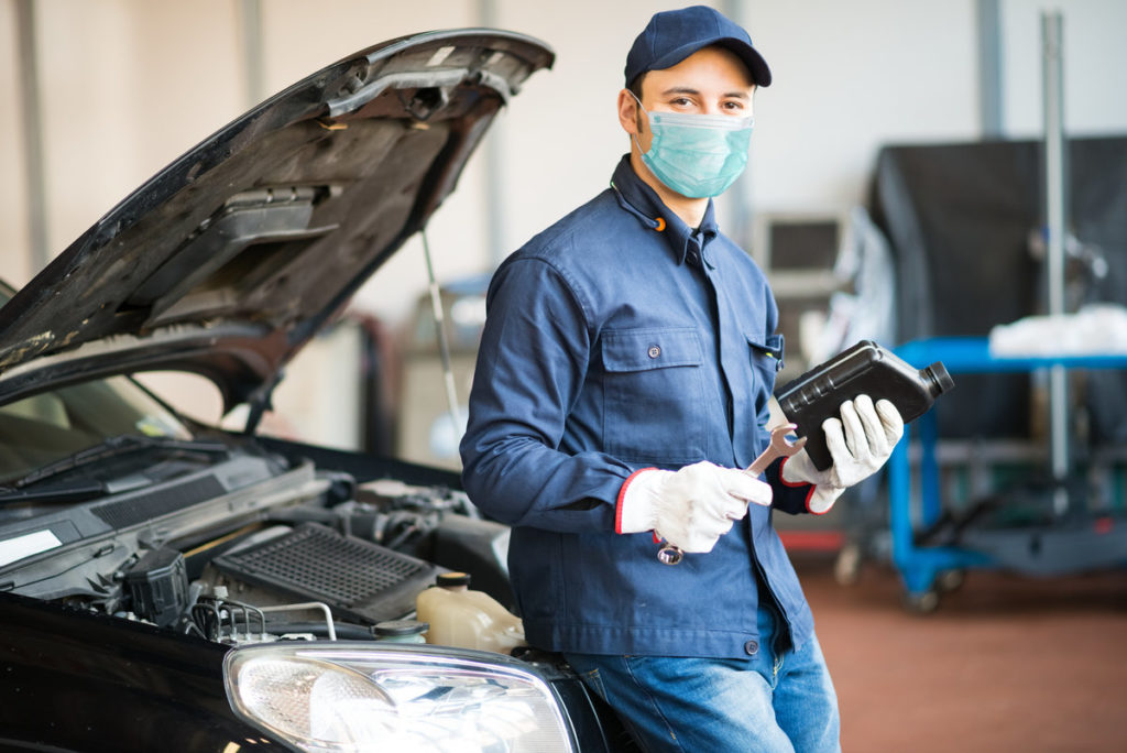 mechanic wearing mask and gloves