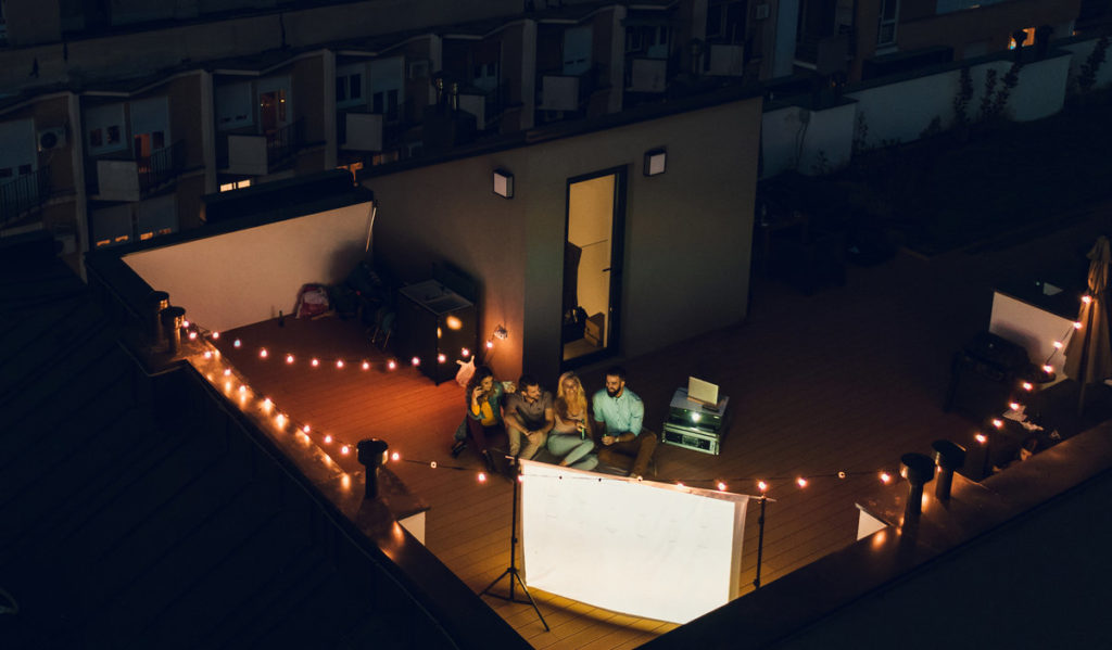 friends watching on a rooftop