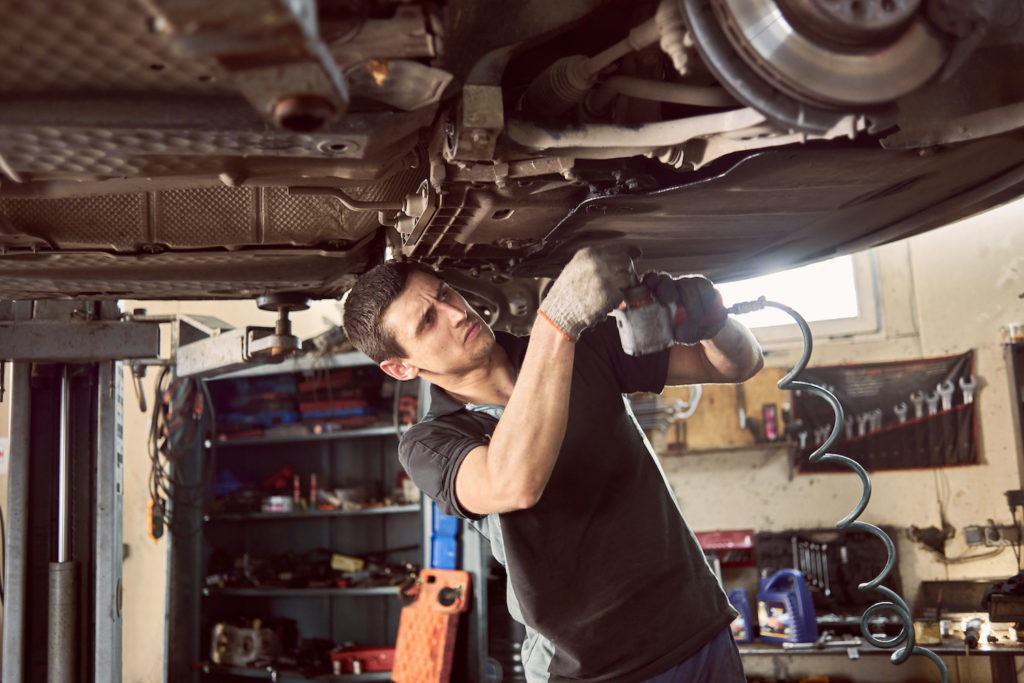 mechanic fixing a car