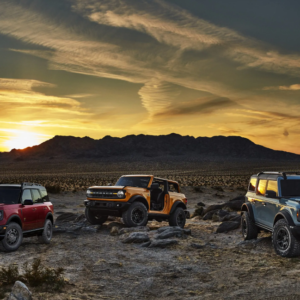 new ford bronco variants against the sunset