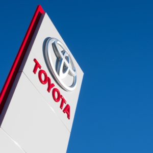 toyota dealership logo againts blue sky