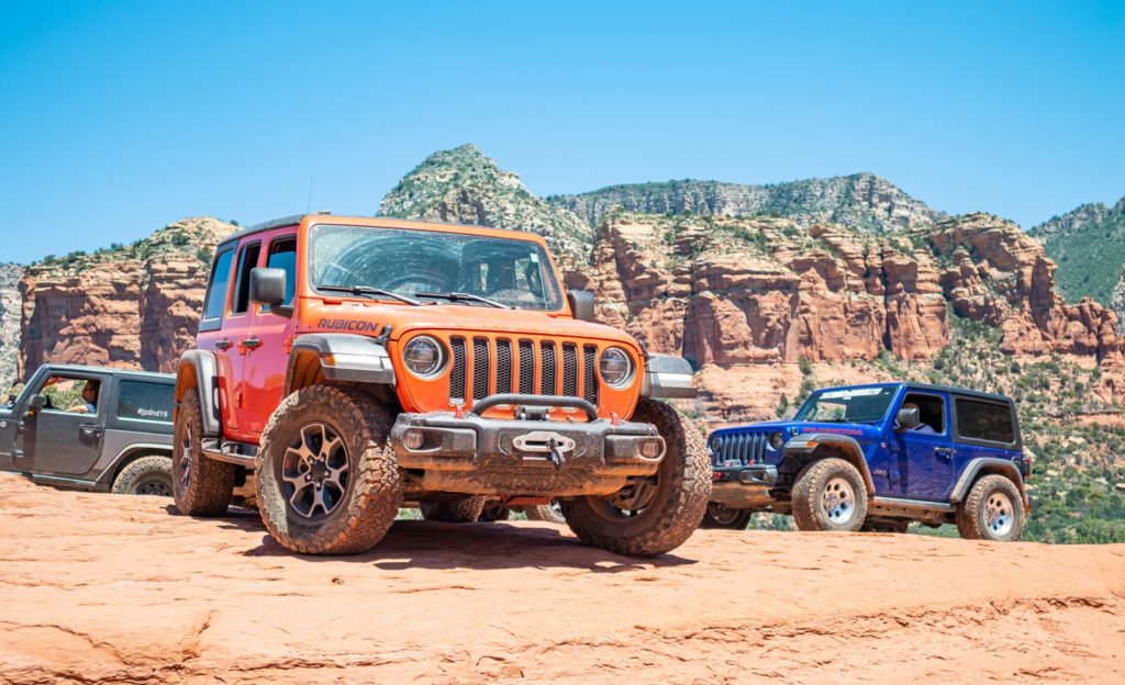 Group of Jeep vehicles in the mountains