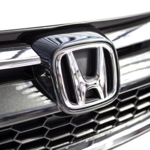 honda chrome logo on car grille