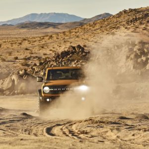 new ford bronco on dusty road scaled