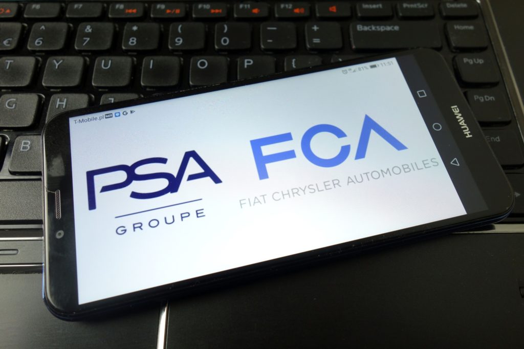 fca and psa logos on mobile phone