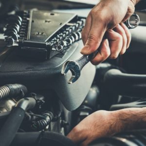 general mechanic fixing car