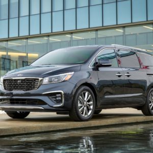 2021 kia sedona parked outside a building