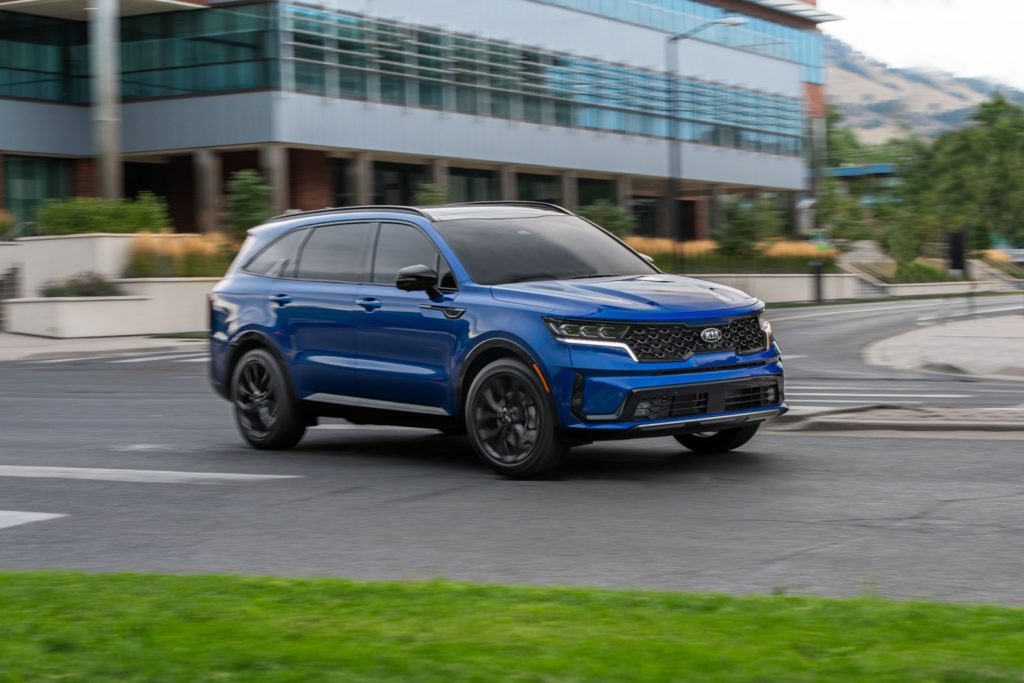 blue 2021 kia sorento on the road