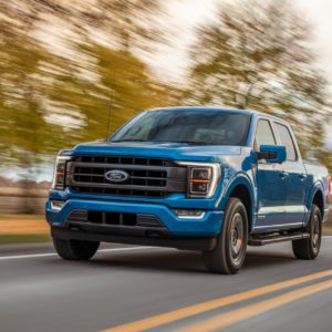 blue 2021 ford f150 on the road