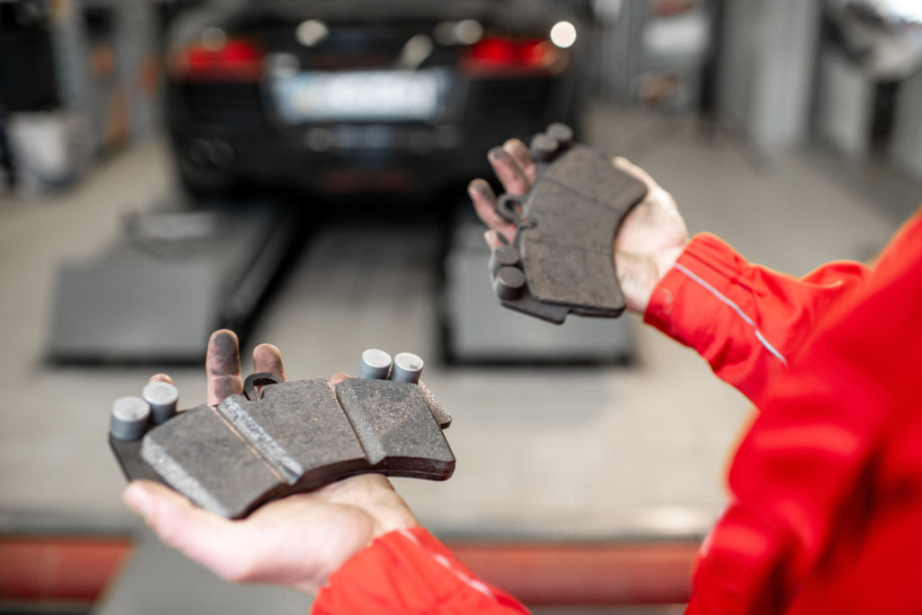 new and old brake pads