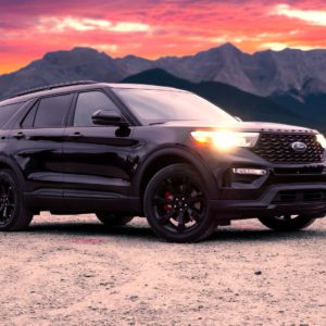 2020 ford explorer in front of mountains during sunset