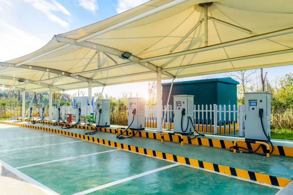 electric car charging station in parking lot