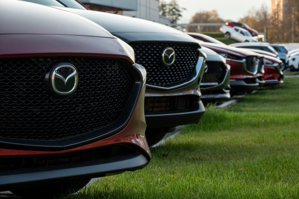 mazda cars parked outside