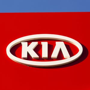 huge kia logo against blue sky