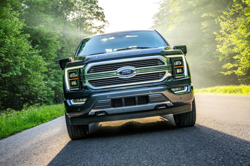 black ford f 150 on the road