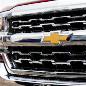 closeup of chevrolet logo on silverado grille