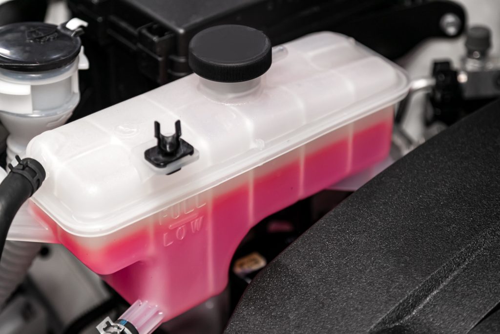 expansion tank with pink antifreeze