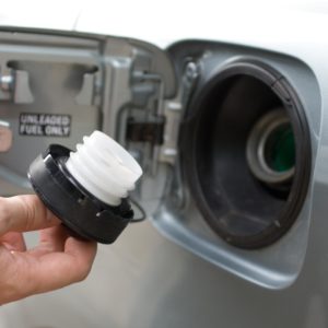 holding a loose gas cap