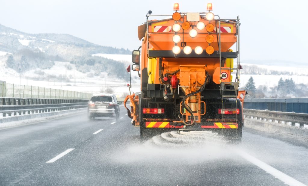 truck deicing road with salt