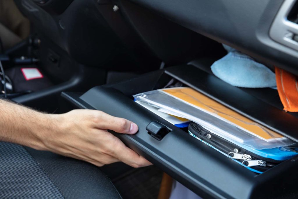 Glove compartment containing documents