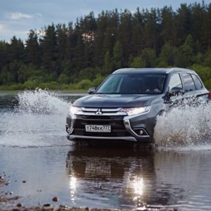 Mitsubishi Outlander on river